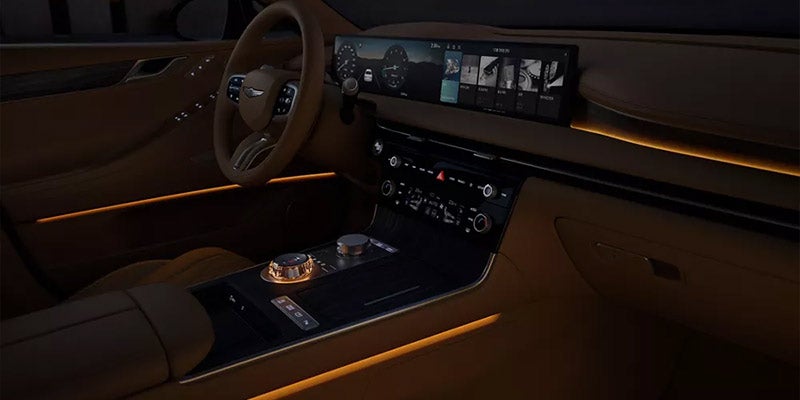 Interior of luxury sedan Genesis G80 is displayed.